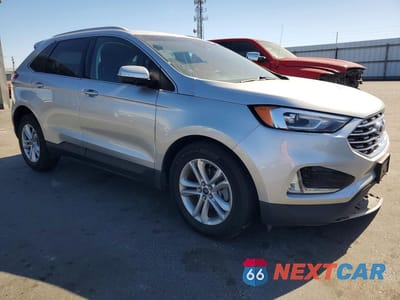 Czwarte zdjęcie samochodu z boku: 2019 FORD EDGE SEL VIN:2FMPK3J90KBC74299 - miniatura