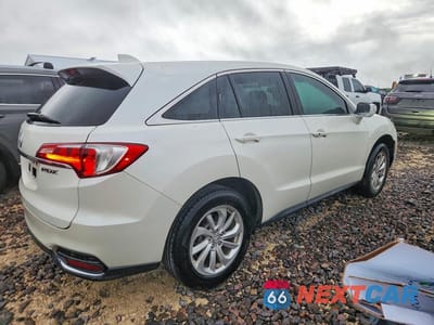 Trzecie zdjęcie samochodu z tyłu: 2017 ACURA RDX VIN:5J8TB3H32HL011066 - miniatura