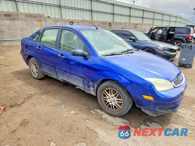 Czwarte zdjęcie samochodu z boku: 2005 FORD FOCUS ZX4 VIN:1FAFP34N95W117390 - miniatura