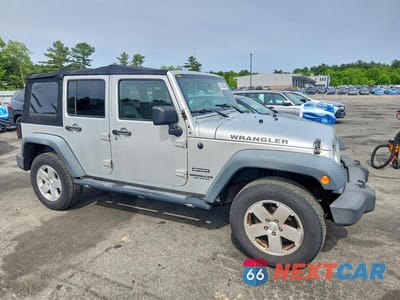 Czwarte zdjęcie samochodu z boku: 2010 JEEP WRANGLER UNLIMITED SPORT VIN:1J4HA3H14AL224672 - miniatura