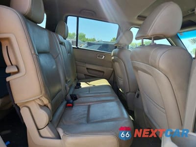 Zdjęcie 11 z 13 samochodu: 2014 HONDA PILOT EXLN VIN:5FNYF4H7XEB039004 - miniatura
