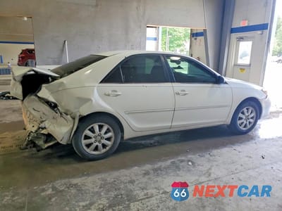 Trzecie zdjęcie samochodu z tyłu: 2003 TOYOTA CAMRY XLE V6 VIN:JTDBF30K430112363 - miniatura
