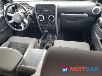 Zdjęcie 8 z 13 samochodu: 2010 JEEP WRANGLER UNLIMITED SAHARA VIN:1J4BA5H19AL162283 - miniatura
