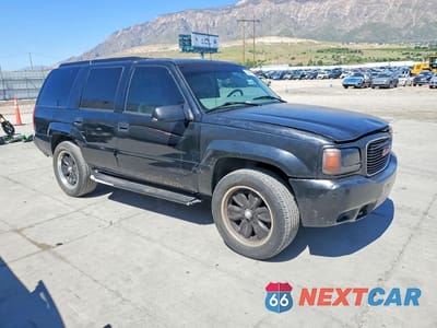 Czwarte zdjęcie samochodu z boku: 2000 GMC YUKON DENALI VIN:1GKEK13R8YR107177 - miniatura