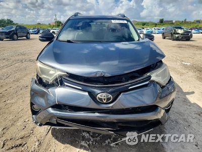 Piąte zdjęcie samochodu w środku: 2018 TOYOTA RAV4 XLE VIN:JTMWFREV8JD132354 - miniatura