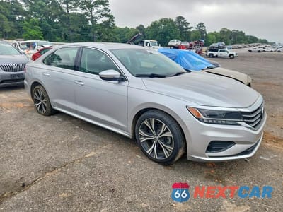 Czwarte zdjęcie samochodu z boku: 2021 VOLKSWAGEN PASSAT SE VIN:1VWSA7A3XMC000676 - miniatura