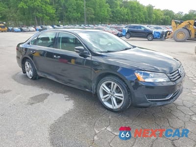 Czwarte zdjęcie samochodu z boku: 2014 VOLKSWAGEN PASSAT SE VIN:1VWBT7A30EC082087 - miniatura