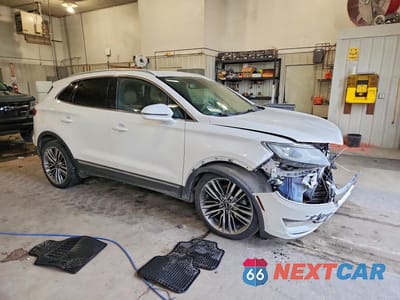 Czwarte zdjęcie samochodu z boku: 2016 LINCOLN MKC RESERVE VIN:5LMTJ3DH7GUJ21762 - miniatura