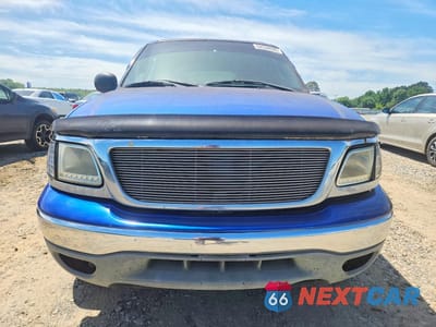 Piąte zdjęcie samochodu w środku: 2001 FORD EXPEDITION XLT VIN:1FMRU15W81LB18825 - miniatura