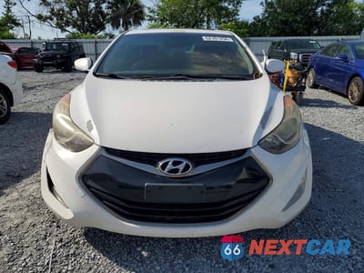 Piąte zdjęcie samochodu w środku: 2013 HYUNDAI ELANTRA COUPE SE VIN:KMHDH6AE0DU004714 - miniatura