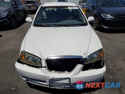 Piąte zdjęcie samochodu w środku: 2004 HYUNDAI ELANTRA GLS VIN:KMHDN46D24U907380 - miniatura