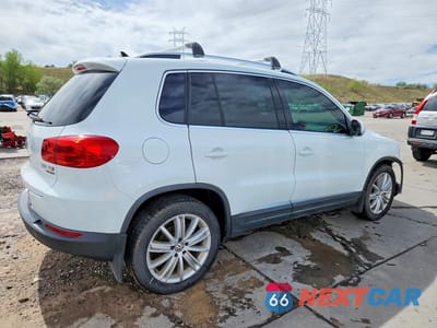 Trzecie zdjęcie samochodu z tyłu: 2014 VOLKSWAGEN TIGUAN S VIN:WVGBV3AX1EW624137 - miniatura