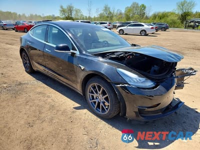 Czwarte zdjęcie samochodu z boku: 2018 TESLA MODEL 3 VIN:5YJ3E1EA8JF037693 - miniatura