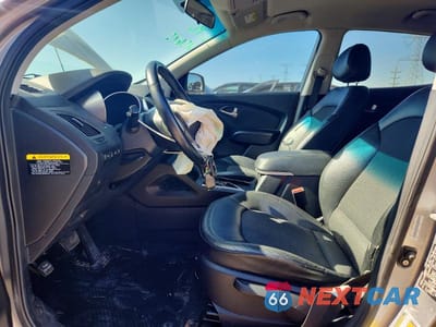 Zdjęcie 7 z 12 samochodu: 2012 HYUNDAI TUCSON GLS VIN:KM8JUCAC2CU529462 - miniatura