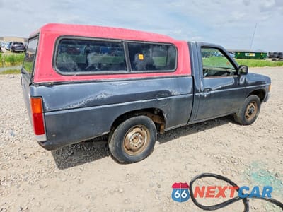 Trzecie zdjęcie samochodu z tyłu: 1993 NISSAN TRUCK SHORT WHEELBASE VIN:1N6SD11S9PC335900 - miniatura