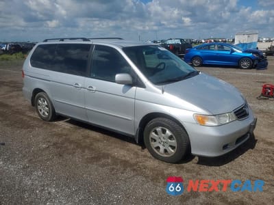 Czwarte zdjęcie samochodu z boku: 2004 HONDA ODYSSEY EX VIN:5FNRL18604B120045 - miniatura