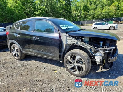Czwarte zdjęcie samochodu z boku: 2016 HYUNDAI TUCSON LIMITED VIN:KM8J3CA29GU034661 - miniatura