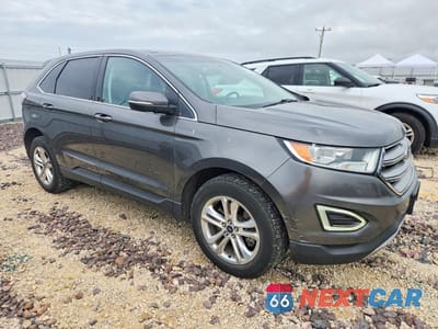 Czwarte zdjęcie samochodu z boku: 2015 FORD EDGE SEL VIN:2FMPK4J89FBC24021 - miniatura