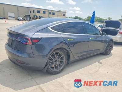 Trzecie zdjęcie samochodu z tyłu: 2020 TESLA MODEL 3 VIN:5YJ3E1EA3LF657841 - miniatura