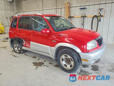 Czwarte zdjęcie samochodu z boku: 2004 SUZUKI GRAND VITARA LX VIN:JS3TD62V644104053 - miniatura