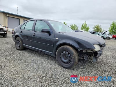 Czwarte zdjęcie samochodu z boku: 2001 VOLKSWAGEN JETTA GL VIN:3VWRB69M41M183232 - miniatura
