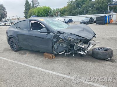 Czwarte zdjęcie samochodu z boku: 2024 TESLA MODEL Y VIN:7SAYGDED2RF020317 - miniatura