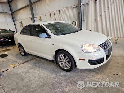 Czwarte zdjęcie samochodu z boku: 2007 VOLKSWAGEN JETTA WOLFSBURG VIN:3VWEF71K87M142825 - miniatura