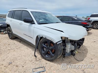Czwarte zdjęcie samochodu z boku: 2023 JEEP GRAND CHEROKEE L LAREDO VIN:1C4RJKAG5P8900089 - miniatura
