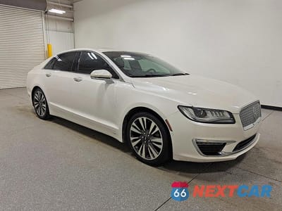 Czwarte zdjęcie samochodu z boku: 2019 LINCOLN MKZ RESERVE II VIN:3LN6L5E93KR607482 - miniatura