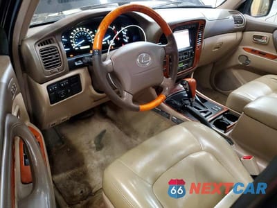 Zdjęcie 8 z 13 samochodu: 2002 LEXUS LX 470 VIN:JTJHT00W723516093 - miniatura