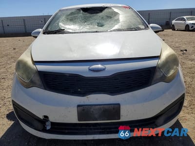 Piąte zdjęcie samochodu w środku: 2013 KIA RIO LX VIN:KNADM4A39D6238323 - miniatura