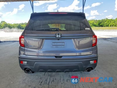 Zdjęcie 6 z 12 samochodu: 2020 HONDA PASSPORT EXL VIN:5FNYF7H50LB005926 - miniatura