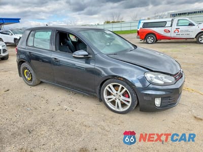 Czwarte zdjęcie samochodu z boku: 2010 VOLKSWAGEN GTI VIN:WVWGD7AJ8AW236364 - miniatura