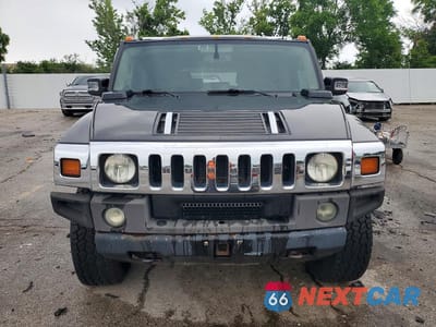 Piąte zdjęcie samochodu w środku: 2004 HUMMER H2 VIN:5GRGN23U24H112847 - miniatura
