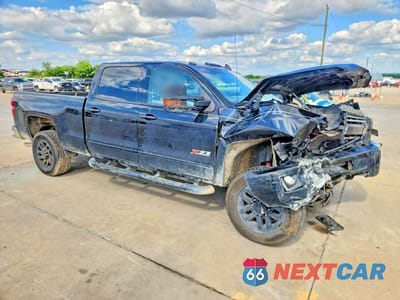 Czwarte zdjęcie samochodu z boku: 2016 CHEVROLET SILVERADO K2500 HEAVY DUTY LT VIN:1GC1KVEG9GF304131 - miniatura