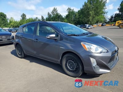 Czwarte zdjęcie samochodu z boku: 2016 TOYOTA PRIUS C TWO VIN:JTDKDTB37G1117035 - miniatura