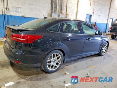 Trzecie zdjęcie samochodu z tyłu: 2015 FORD FOCUS SE VIN:1FADP3F27FL218408 - miniatura