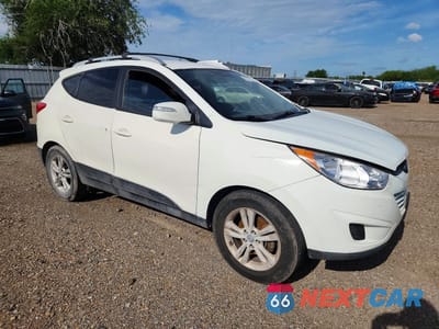 Czwarte zdjęcie samochodu z boku: 2012 HYUNDAI TUCSON GLS VIN:KM8JU3AC1CU337658 - miniatura
