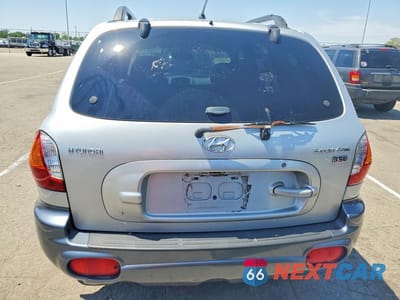 Zdjęcie 6 z 13 samochodu: 2004 HYUNDAI SANTA FE GLS VIN:KM8SC13E64U827718 - miniatura