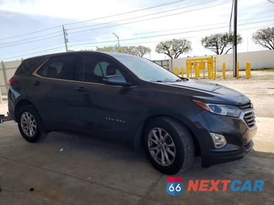 Czwarte zdjęcie samochodu z boku: 2018 CHEVROLET EQUINOX LT VIN:2GNAXJEV1J6323757 - miniatura