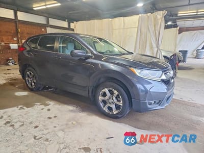 Czwarte zdjęcie samochodu z boku: 2018 HONDA CR-V EX VIN:2HKRW2H59JH623008 - miniatura