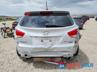 Zdjęcie 6 z 13 samochodu: 2013 HYUNDAI TUCSON LIMITED VIN:KM8JUCAC4DU563730 - miniatura