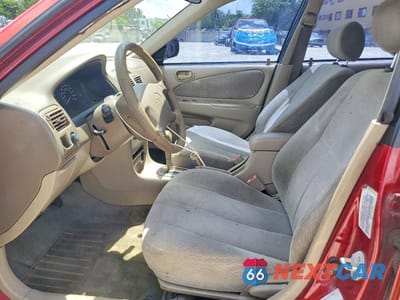 Zdjęcie 7 z 12 samochodu: 2001 TOYOTA COROLLA LE VIN:2T1BR12E01C427716 - miniatura