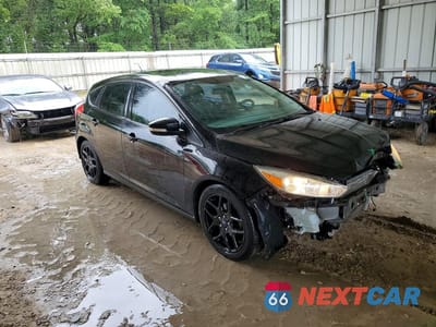 Czwarte zdjęcie samochodu z boku: 2016 FORD FOCUS SE VIN:1FADP3K25GL274094 - miniatura