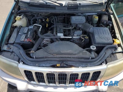 Zdjęcie 12 z 13 samochodu: 1999 JEEP GRAND CHEROKEE LAREDO VIN:1J4GW58S6XC569065 - miniatura