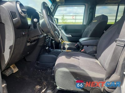 Zdjęcie 7 z 13 samochodu: 2013 JEEP WRANGLER UNLIMITED SAHARA VIN:1C4BJWEG3DL635829 - miniatura
