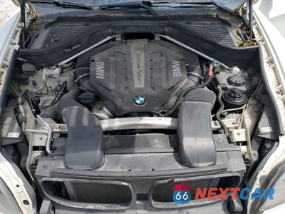 Zdjęcie 12 z 13 samochodu: 2013 BMW X5 XDRIVE50I VIN:5UXZV8C59D0C16807 - miniatura