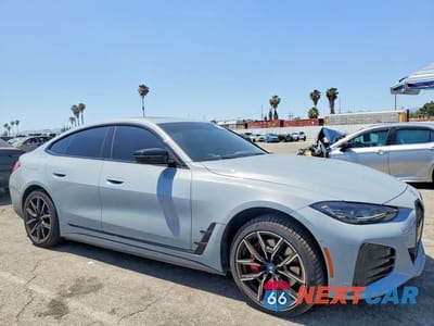 Czwarte zdjęcie samochodu z boku: 2024 BMW I4 EDRIVE 35 VIN:WBY43AW04RFS79810 - miniatura