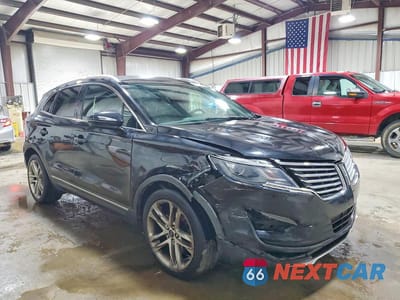 Czwarte zdjęcie samochodu z boku: 2015 LINCOLN MKC VIN:5LMTJ2AH6FUJ22527 - miniatura