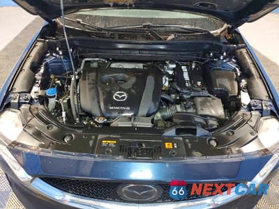 Zdjęcie 12 z 13 samochodu: 2021 MAZDA CX-5 GRAND TOURING VIN:JM3KFADM6M0333973 - miniatura